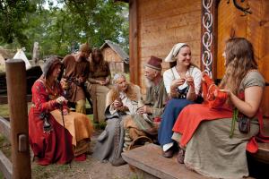 Vikings in front of a House Photo