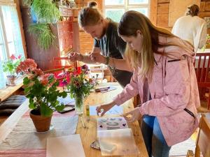 Preparation of materials for the camp in Äijälä's main building. Photo